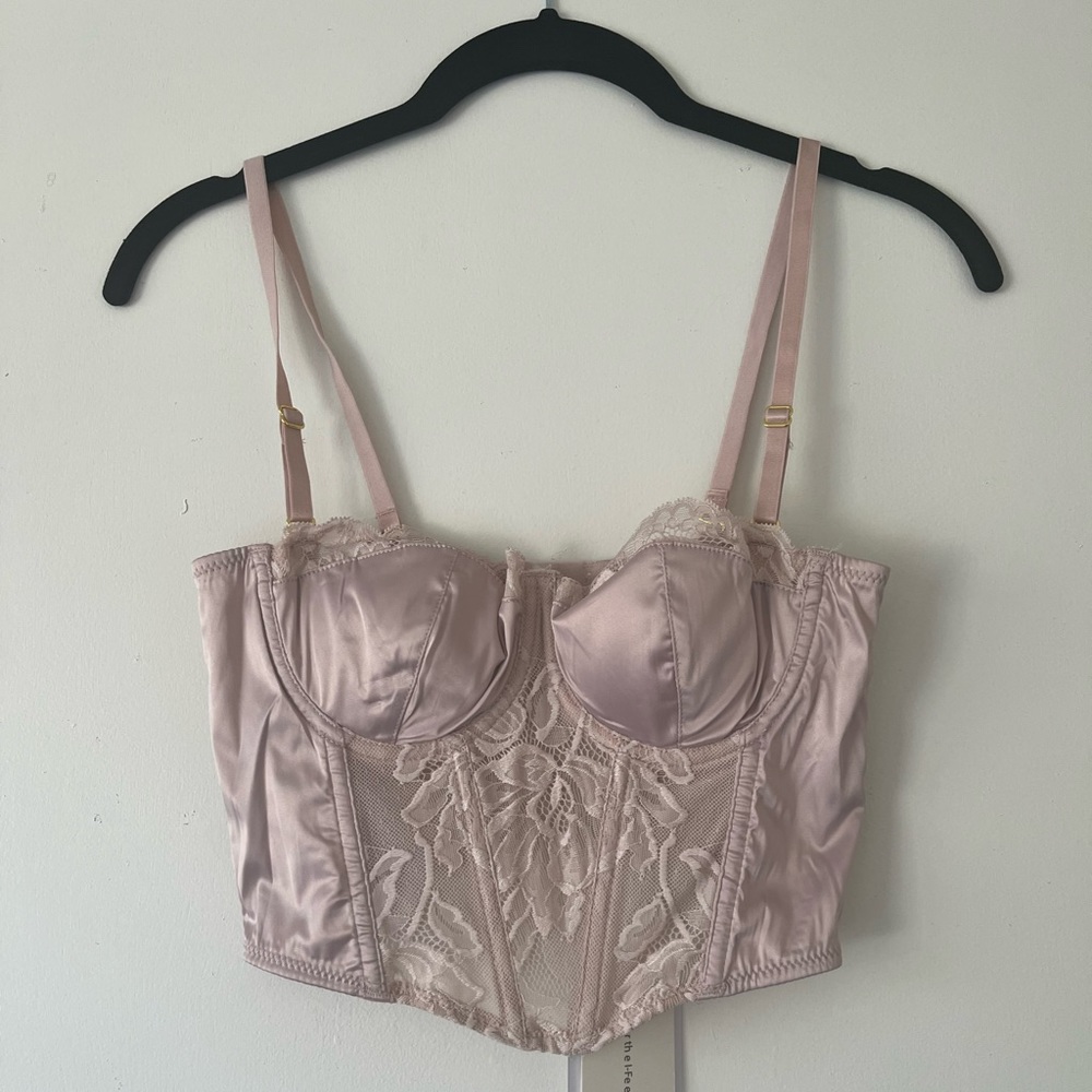 Dusty Rose corset top. I would keep an if it fit my upper body right.